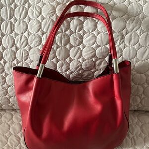 Alfani bag.  Beautiful Red bag with a touch of black trim.  Nice size.